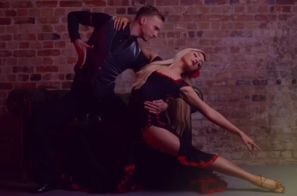 Dive into the vibrant world of Latin dance with Joshua & Lowri, an electrifying duo based in London. Experience the passion and energy. Image: "Joshua & Lowri Latin Dance London"